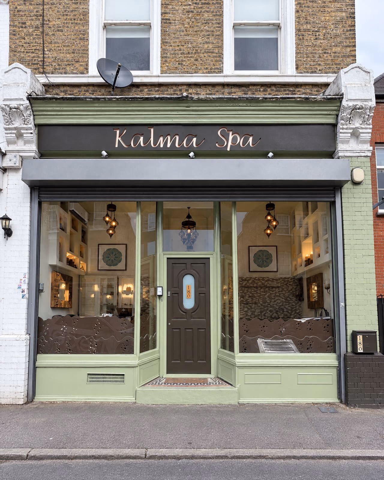 The Kalma Spa shopfront on Broadhurst Gardens in daylight.